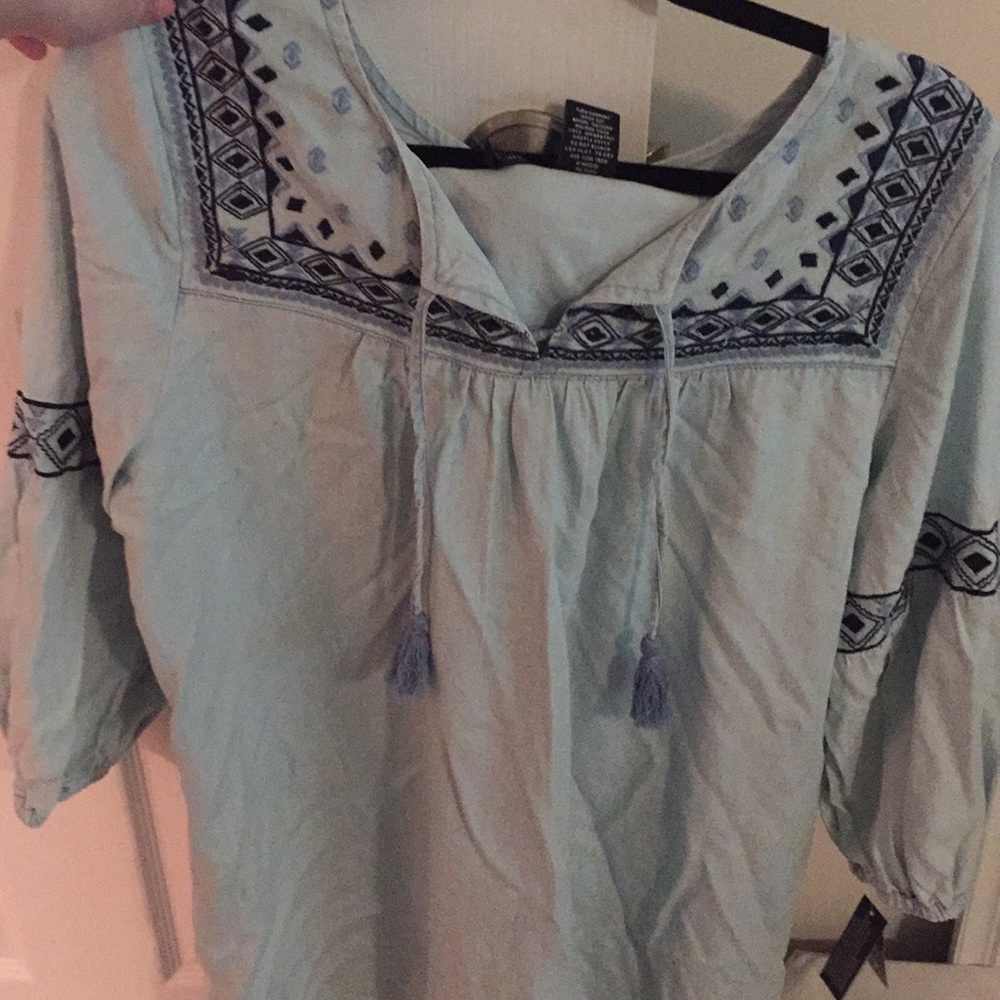 Blue dress with tassels & pattern